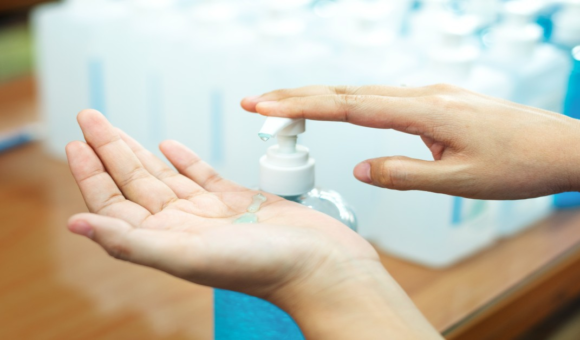 Hand sanitizer being applied to hands.