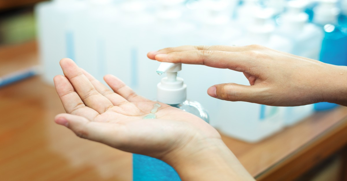 Hand sanitizer being applied to hands.