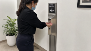 Touch-free stainless steel sanitizer dispenser